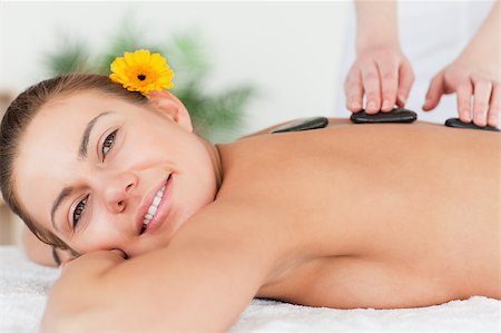 simsearch:400-04881818,k - Charming woman having a hot stone massage  in a spa Foto de stock - Super Valor sin royalties y Suscripción, Código: 400-04884155