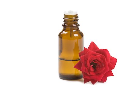 Bottles of essential oil and red rose Stock Photo - Budget Royalty-Free & Subscription, Code: 400-04884864