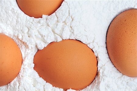 simsearch:400-06640932,k - fresh organic brown eggs on white flour powder Stock Photo - Budget Royalty-Free & Subscription, Code: 400-04885459