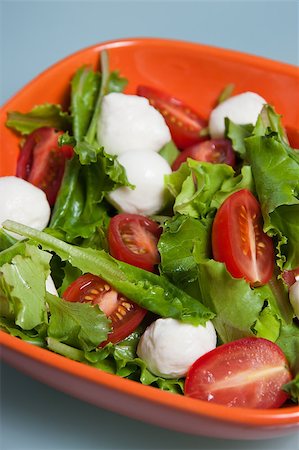 simsearch:400-07217493,k - Salad with fresh lettuce leaves, tomatoes and cucumbers Photographie de stock - Aubaine LD & Abonnement, Code: 400-04885487