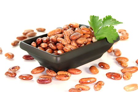red mottled and dried pinto beans with coriander Photographie de stock - Aubaine LD & Abonnement, Code: 400-04885507