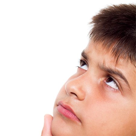 Close up, cropped  portrait of a young boy looking up, wondering, isolated on pure white background Stock Photo - Budget Royalty-Free & Subscription, Code: 400-04885588