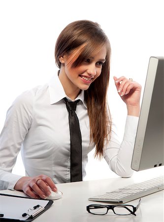 simsearch:400-04785322,k - pretty girl works at the computer Stock Photo - Budget Royalty-Free & Subscription, Code: 400-04886236