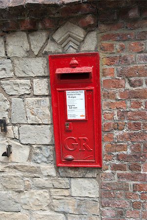 red mailbox - A Red British Post Box set in a stone wall Stock Photo - Budget Royalty-Free & Subscription, Code: 400-04886883