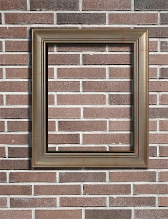 Blank photo frame on old brick wall. Stock Photo - Budget Royalty-Free & Subscription, Code: 400-04887236