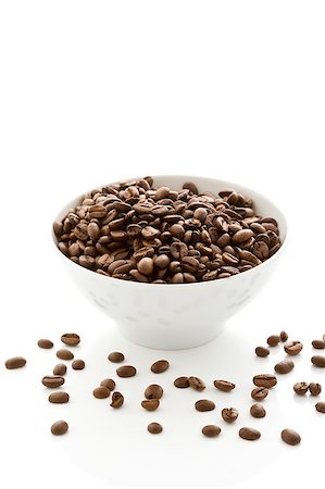 photo of delicious coffee beans inside a white bowl on white isolated background Stock Photo - Budget Royalty-Free & Subscription, Code: 400-04887446
