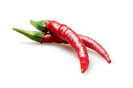 simsearch:400-07211737,k - red hot chilli peppers isolated on white Photographie de stock - Aubaine LD & Abonnement, Code: 400-04887647