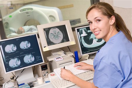 simsearch:400-04887902,k - Nurse Monitoring Patient Having A Computerized Axial Tomography (CAT) Scan Stock Photo - Budget Royalty-Free & Subscription, Code: 400-04887866