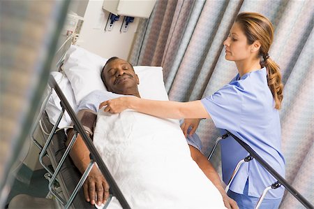 simsearch:400-04887902,k - Nurse Caring For Patient Stock Photo - Budget Royalty-Free & Subscription, Code: 400-04887895