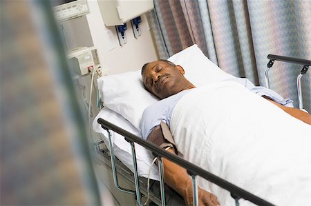 simsearch:400-04887902,k - Patient Sleeping In Hospital Bed Stock Photo - Budget Royalty-Free & Subscription, Code: 400-04887898