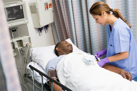 simsearch:400-04887902,k - Nurse Caring For Patient Stock Photo - Budget Royalty-Free & Subscription, Code: 400-04887892