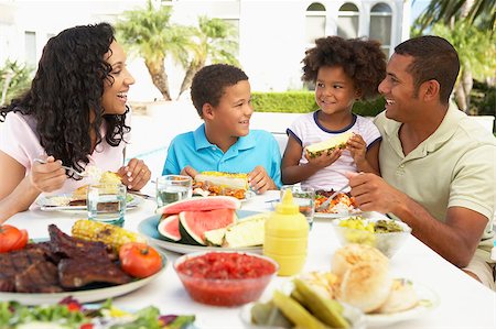 Family Eating An Al Fresco Meal Stock Photo - Budget Royalty-Free & Subscription, Code: 400-04888061