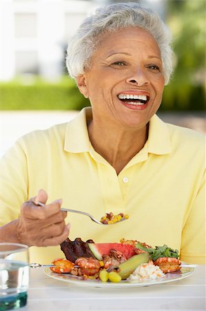 Senior Woman Dining Al Fresco Stock Photo - Budget Royalty-Free & Subscription, Code: 400-04888079