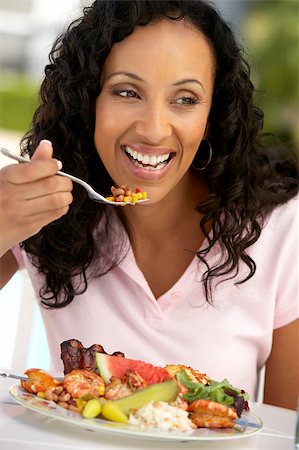 Middle Aged Woman Dining Al Fresco Stock Photo - Budget Royalty-Free & Subscription, Code: 400-04888072