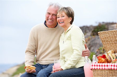 Couple Eating An Al Fresco Meal At The Beach Stock Photo - Budget Royalty-Free & Subscription, Code: 400-04888124