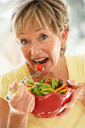 simsearch:400-04888522,k - Senior Woman Eating Fresh Salad Stock Photo - Budget Royalty-Free & Subscription, Code: 400-04888198