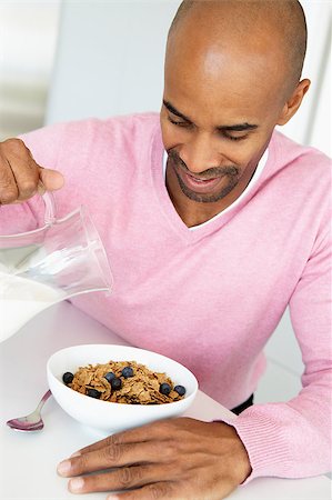 Middle Aged Man Eating Healthy Breakfast Stock Photo - Budget Royalty-Free & Subscription, Code: 400-04888274