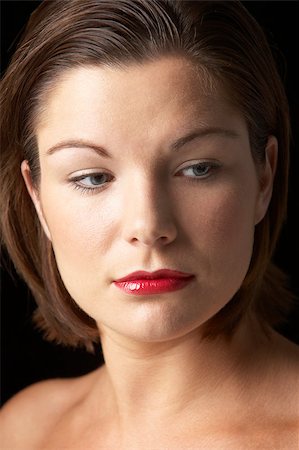 simsearch:614-06311603,k - Portrait Of Young Woman With Red Lipstick Photographie de stock - Aubaine LD & Abonnement, Code: 400-04888559