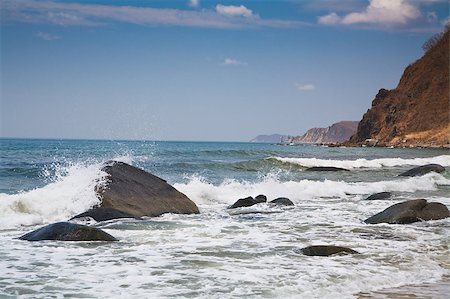 Beautiful sandy sea beach. Hill with trees growing on them. Stock Photo - Budget Royalty-Free & Subscription, Code: 400-04889168