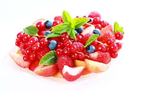 Delicious fresh berries served in bowl as dessert Photographie de stock - Aubaine LD & Abonnement, Code: 400-04889582