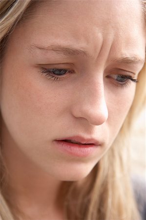 simsearch:400-04889881,k - Portrait Of Teenage Girl Looking Upset Stock Photo - Budget Royalty-Free & Subscription, Code: 400-04889699
