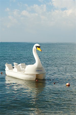 pedal boat - A fancy swan paddle boat waiting for someone to have fun Stock Photo - Budget Royalty-Free & Subscription, Code: 400-04889777