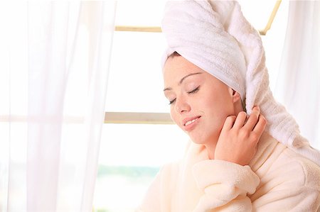 Beautiful woman relaxes by the window at a spa Stock Photo - Budget Royalty-Free & Subscription, Code: 400-04889810