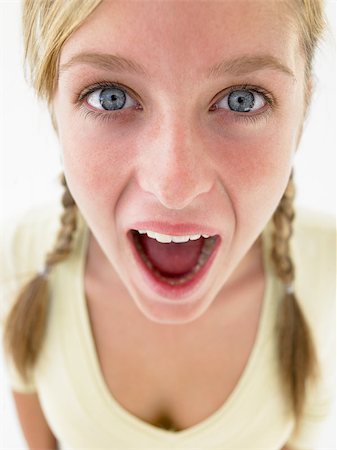 simsearch:400-04889881,k - Portrait Of Teenage Girl Looking Shocked Stock Photo - Budget Royalty-Free & Subscription, Code: 400-04889879