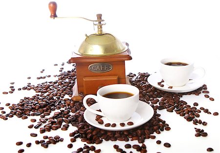 simsearch:400-07299272,k - Old coffee grinder and roasted coffee beans over white background Fotografie stock - Microstock e Abbonamento, Codice: 400-04880493