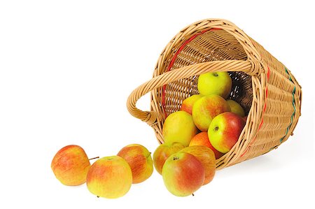 simsearch:400-04053662,k - Fresh apples spilling out of basket - isolated on white background. Clipping path included. Stock Photo - Budget Royalty-Free & Subscription, Code: 400-04880598