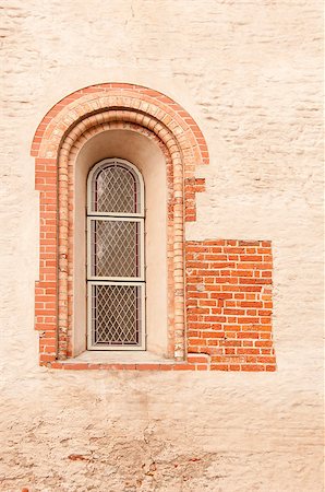 simsearch:400-08615330,k - the antique window in stone wall with red bricks Stock Photo - Budget Royalty-Free & Subscription, Code: 400-04880645