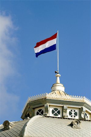 This photograph represents the Dutch flag on the roof of Kurhaus hotel in Scheveningen. Stock Photo - Budget Royalty-Free & Subscription, Code: 400-04880654