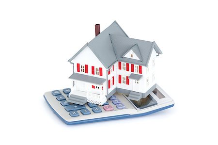simsearch:400-06855814,k - Miniature house with a calculator against a white background Foto de stock - Royalty-Free Super Valor e Assinatura, Número: 400-04881067