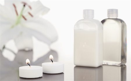 simsearch:400-04881211,k - White orchid  glass flasks and lighted white candles the camera focus on the objects Stock Photo - Budget Royalty-Free & Subscription, Code: 400-04881213