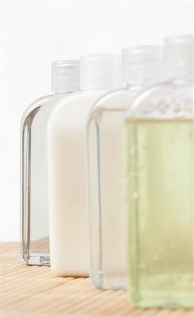 Close up of four massage oil bottles Photographie de stock - Aubaine LD & Abonnement, Code: 400-04881317