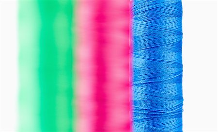 simsearch:400-05709732,k - Colorful spools of thread against a white background Stock Photo - Budget Royalty-Free & Subscription, Code: 400-04881719