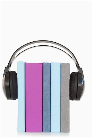 simsearch:400-04434314,k - A stack of books and headphones against a white background Photographie de stock - Aubaine LD & Abonnement, Code: 400-04882261