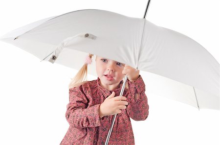 Shot of little girl with umbrella in studio Stock Photo - Budget Royalty-Free & Subscription, Code: 400-04882518