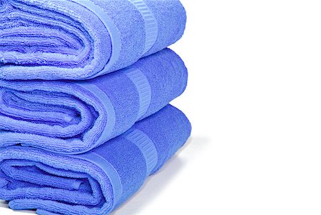 simsearch:400-04501066,k - Three blue towels on a white background Stock Photo - Budget Royalty-Free & Subscription, Code: 400-04882596