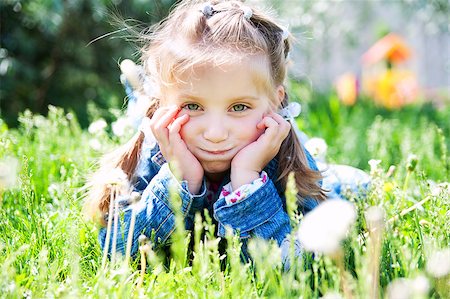 simsearch:400-05342069,k - cute little girl smiling in a park close-up Stock Photo - Budget Royalty-Free & Subscription, Code: 400-04882693