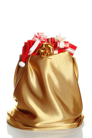 sunny_baby (artist) - Sack of gold color filled to the brim with Christmas gifts. At one gift Santa's wearing a cap. Isolated on a white background Foto de stock - Royalty-Free Super Valor e Assinatura, Número: 400-04882709