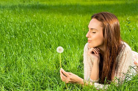 simsearch:400-04107729,k - Girl with dandelion on the green field Stock Photo - Budget Royalty-Free & Subscription, Code: 400-04882799