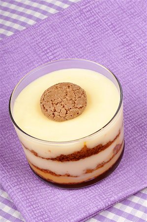 Close-up of vanilla custard and amaretti dessert served in a glass cup over a pink background. Selective focus. Stock Photo - Budget Royalty-Free & Subscription, Code: 400-04882956