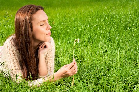 simsearch:400-04107729,k - Girl with dandelion on the green field Stock Photo - Budget Royalty-Free & Subscription, Code: 400-04883197