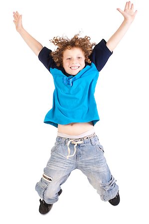 simsearch:400-06795514,k - Young and attractive kid jumping high, indoors, isolated against white background... Photographie de stock - Aubaine LD & Abonnement, Code: 400-04883454