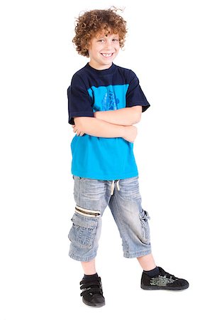 simsearch:400-06795514,k - Young preschool boy posing with arms crossed isolated on white background... Photographie de stock - Aubaine LD & Abonnement, Code: 400-04883453