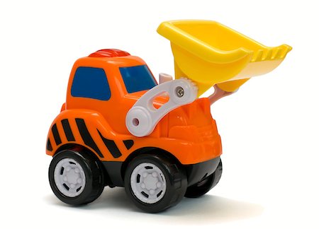 funny truck transport - Funny orange toy excavator, isolated Stock Photo - Budget Royalty-Free & Subscription, Code: 400-04883732