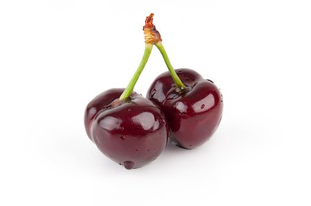 Isolated Red Cherries Photographie de stock - Aubaine LD & Abonnement, Code: 400-04883799