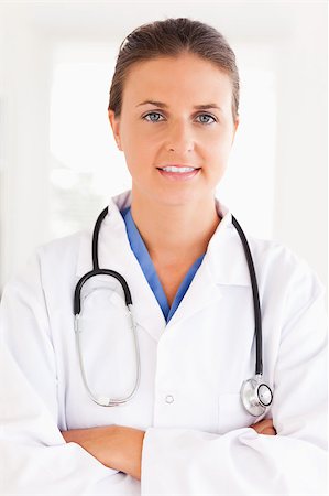 simsearch:400-05192323,k - Portrait of a beautiful doctor with a stethoscope in the surgery Stock Photo - Budget Royalty-Free & Subscription, Code: 400-04894203
