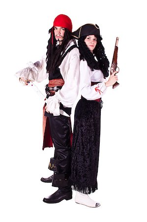 A man and a woman dressed as a pirate, pistol and saber. White background. Studio photography. Stock Photo - Budget Royalty-Free & Subscription, Code: 400-04894297